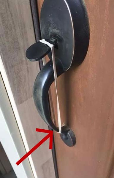 If you spot a rubber band on your front door handle, you need to know the sick thing it means