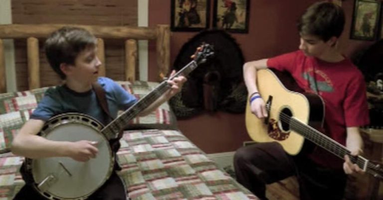 Boy’s Fingers Blur Playing ‘Dueling Banjos’ Then Big Brother Kicks It Up A Notch
