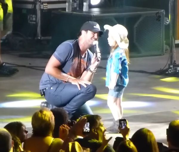 Luke Bryan Joined by Enthusiastic Young Fan Onstage Who Sings Along to Every Word!